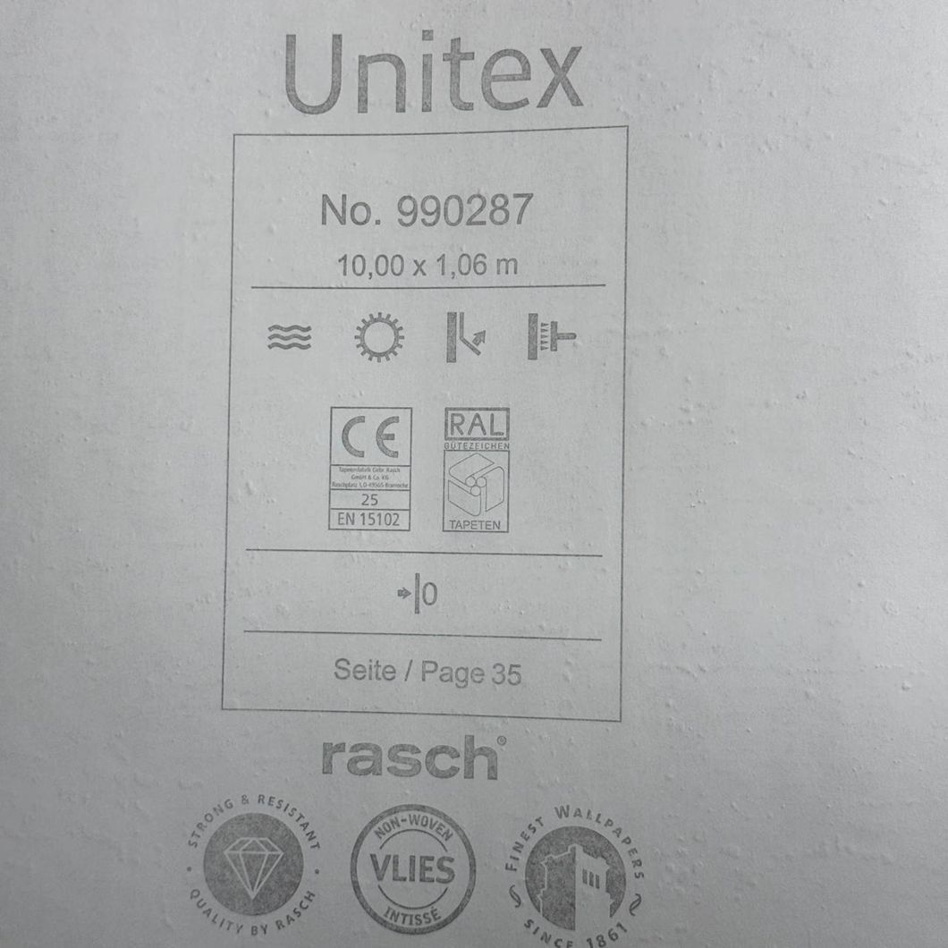 Шпалери вінілові на флізеліновій основі Rasch Unitex сірі 1,06 х 10,05м (990287)