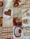Клейонка на стіл ПВХ на нетканій основі Кава кекси коричневий 1,37 х 1м (100-218), Коричневий, Коричневий
